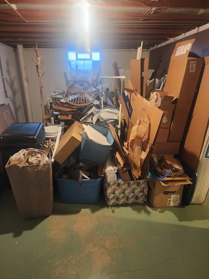 Roll-off dumpster container at job site for Yard Waste Dumpster Rental in Stratford